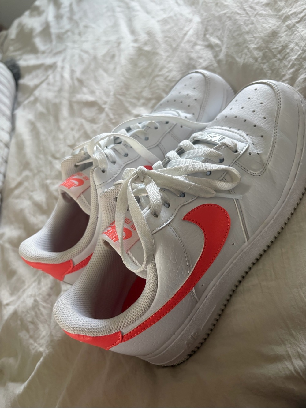 Nike White Sneakers with Coral Swoosh